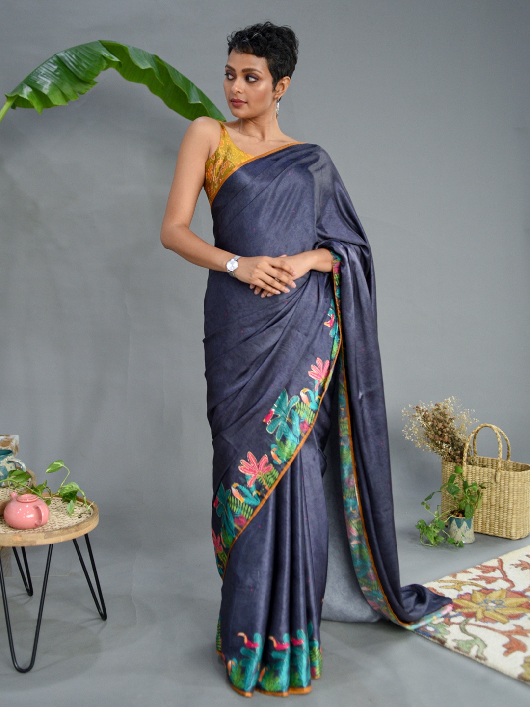 

Suta Blue & Green Floral Printed Saree