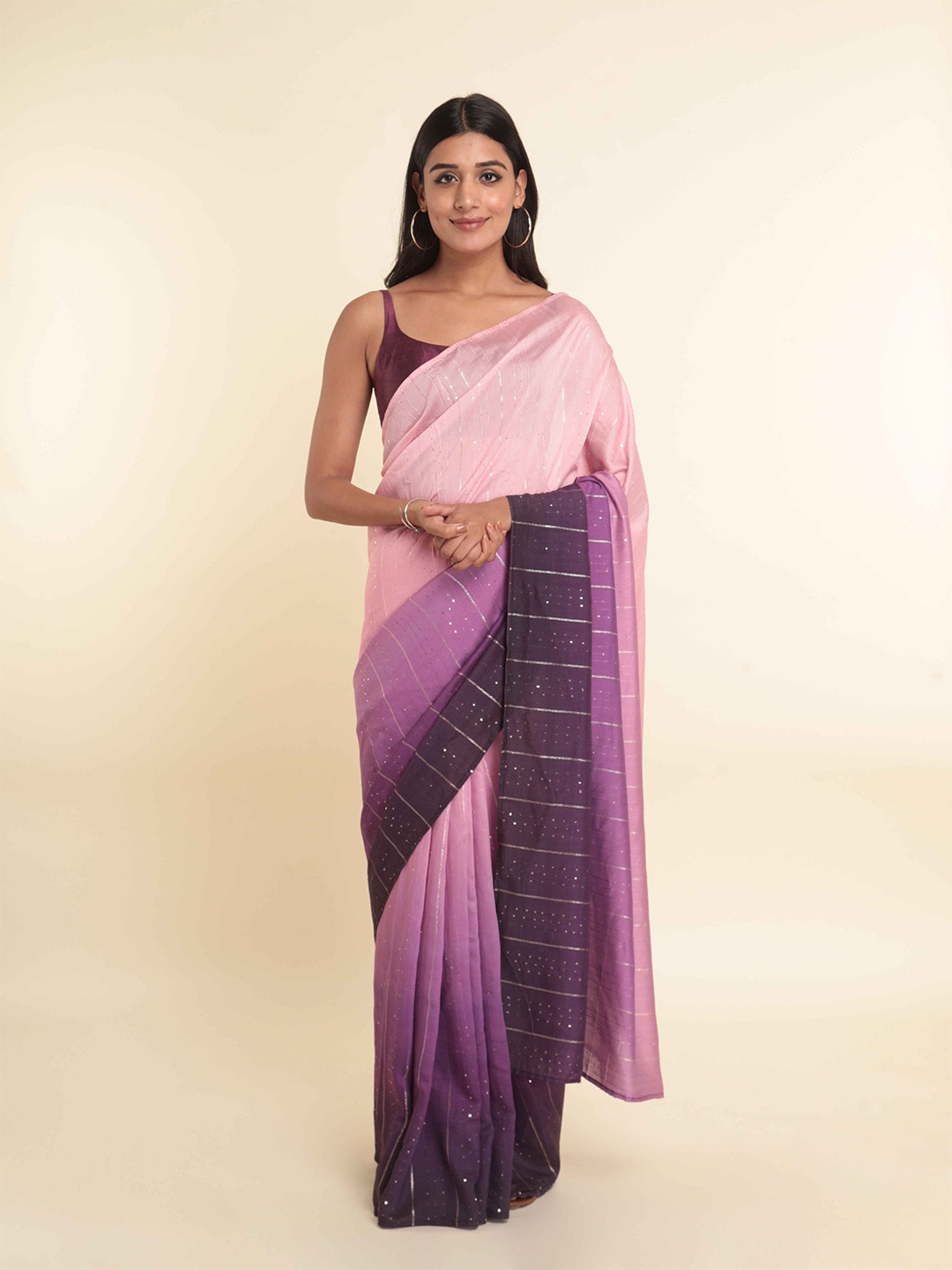 

Suta Purple & Pink Embellished Saree