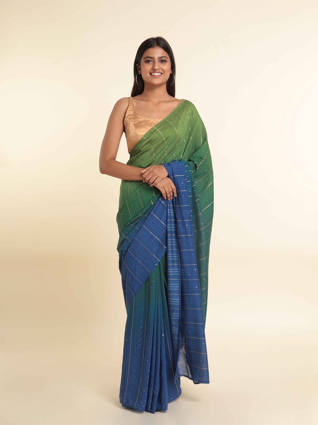 

Suta Green & Blue Embellished Saree