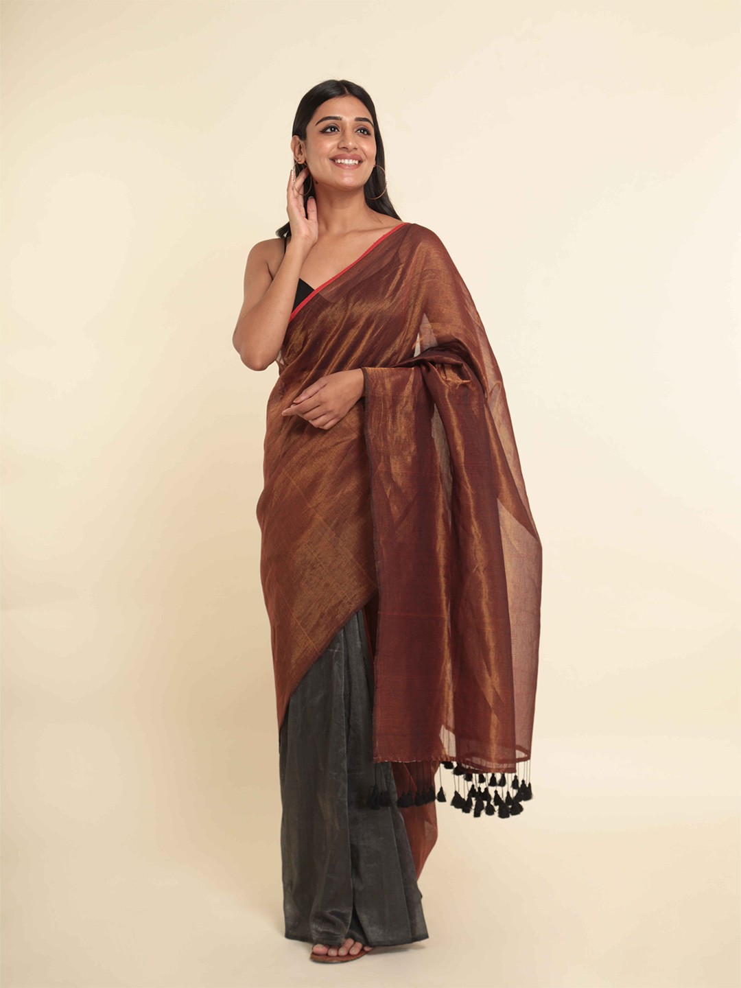 

Suta Coffee Brown & Grey Solid Saree