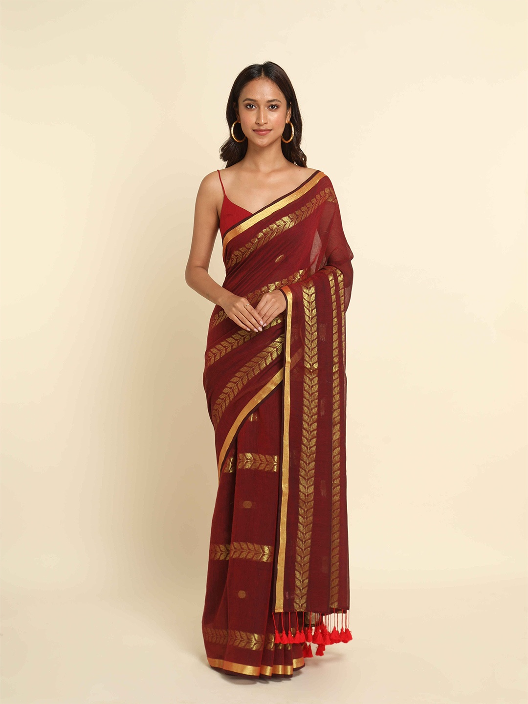 

Suta Maroon & Gold-Toned Woven Design Cotton Blend Saree