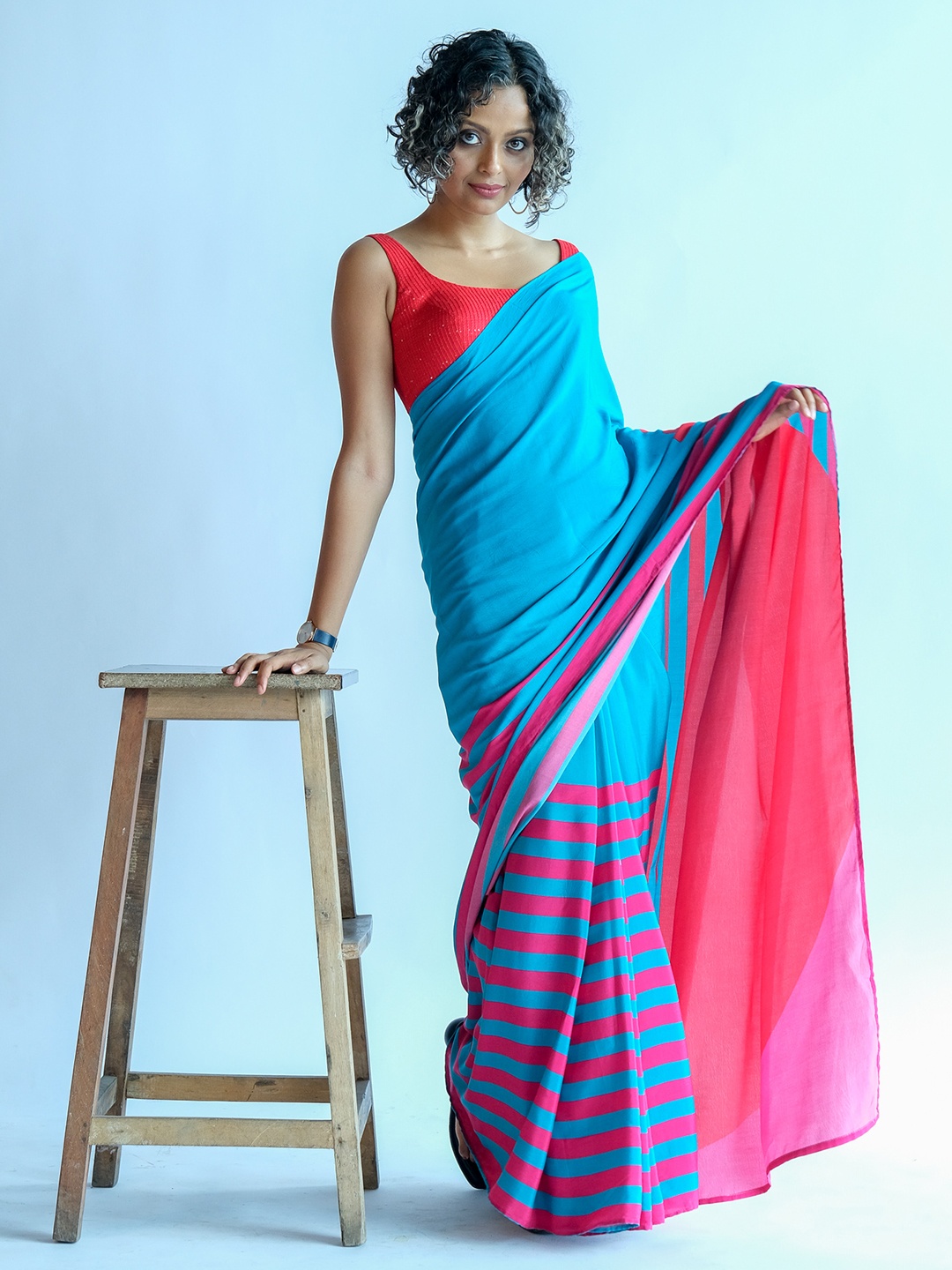 

Suta Blue & Pink Striped Liva Saree