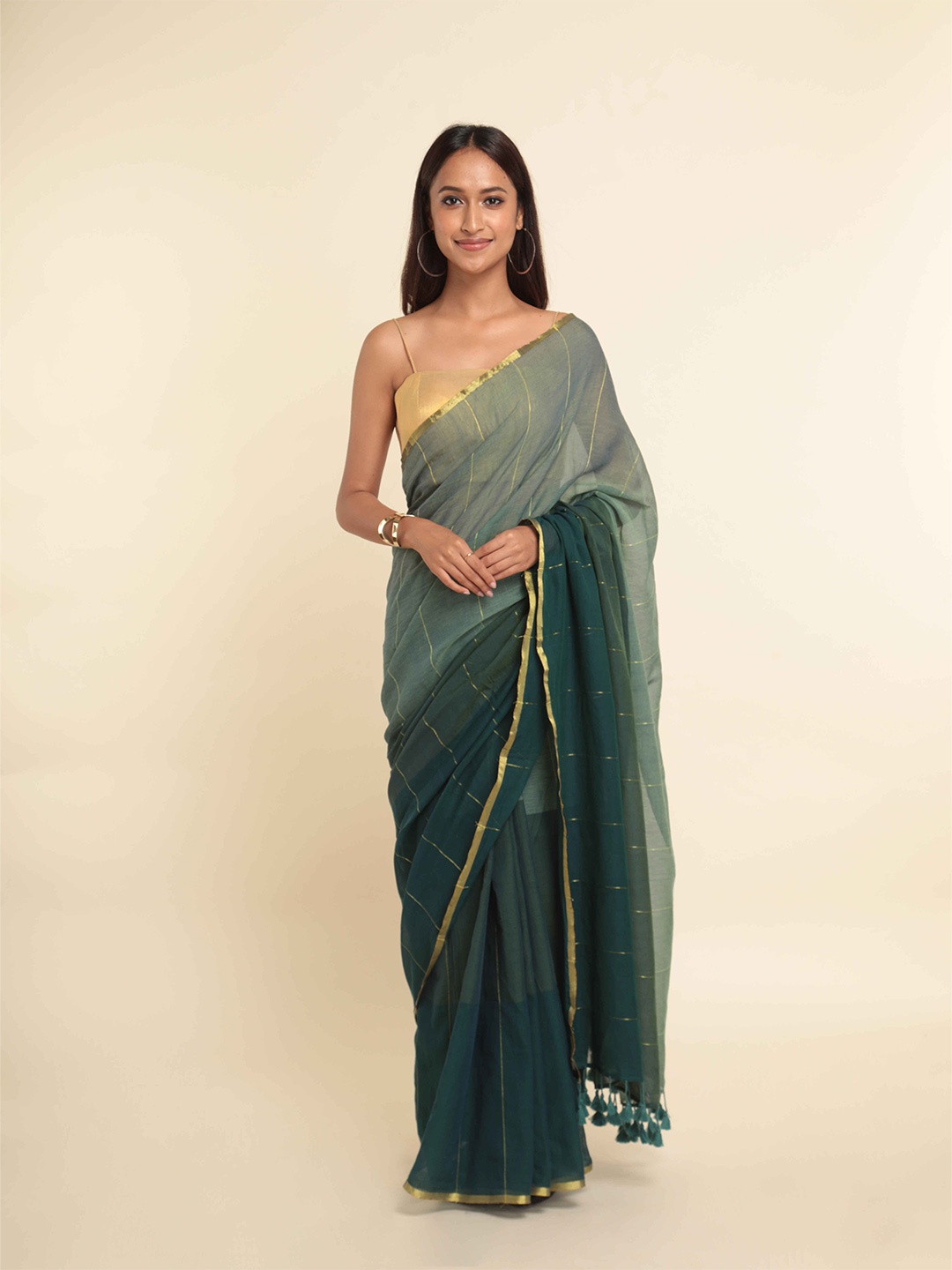 

Suta Green Solid Ombre Saree