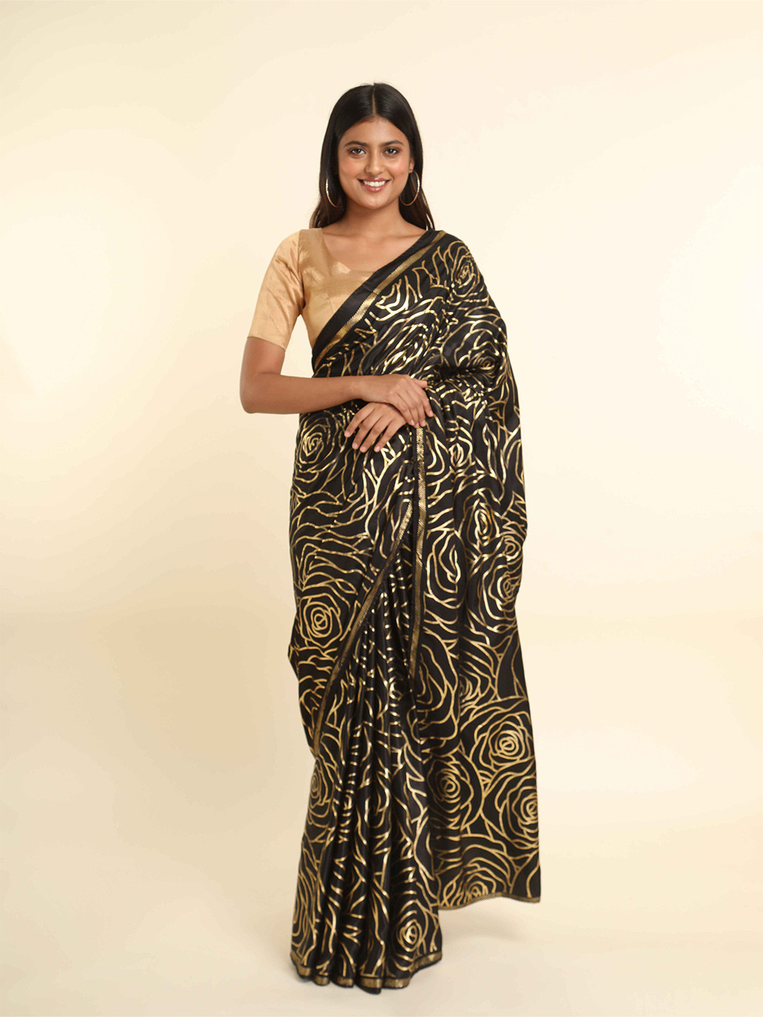 

Suta Black & Golden Floral Zari Saree