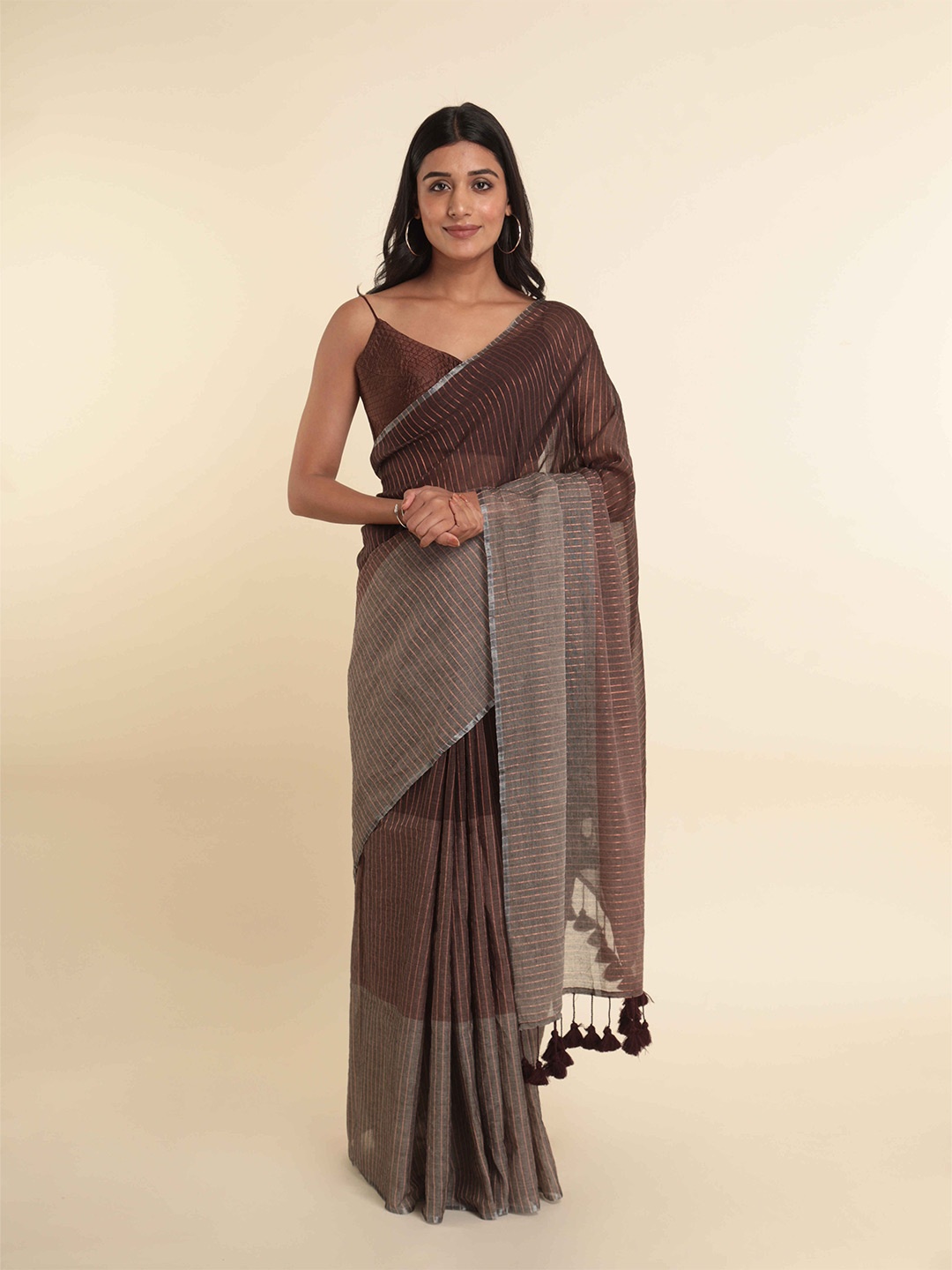 

Suta Brown Colourblocked Cotton Blend Saree