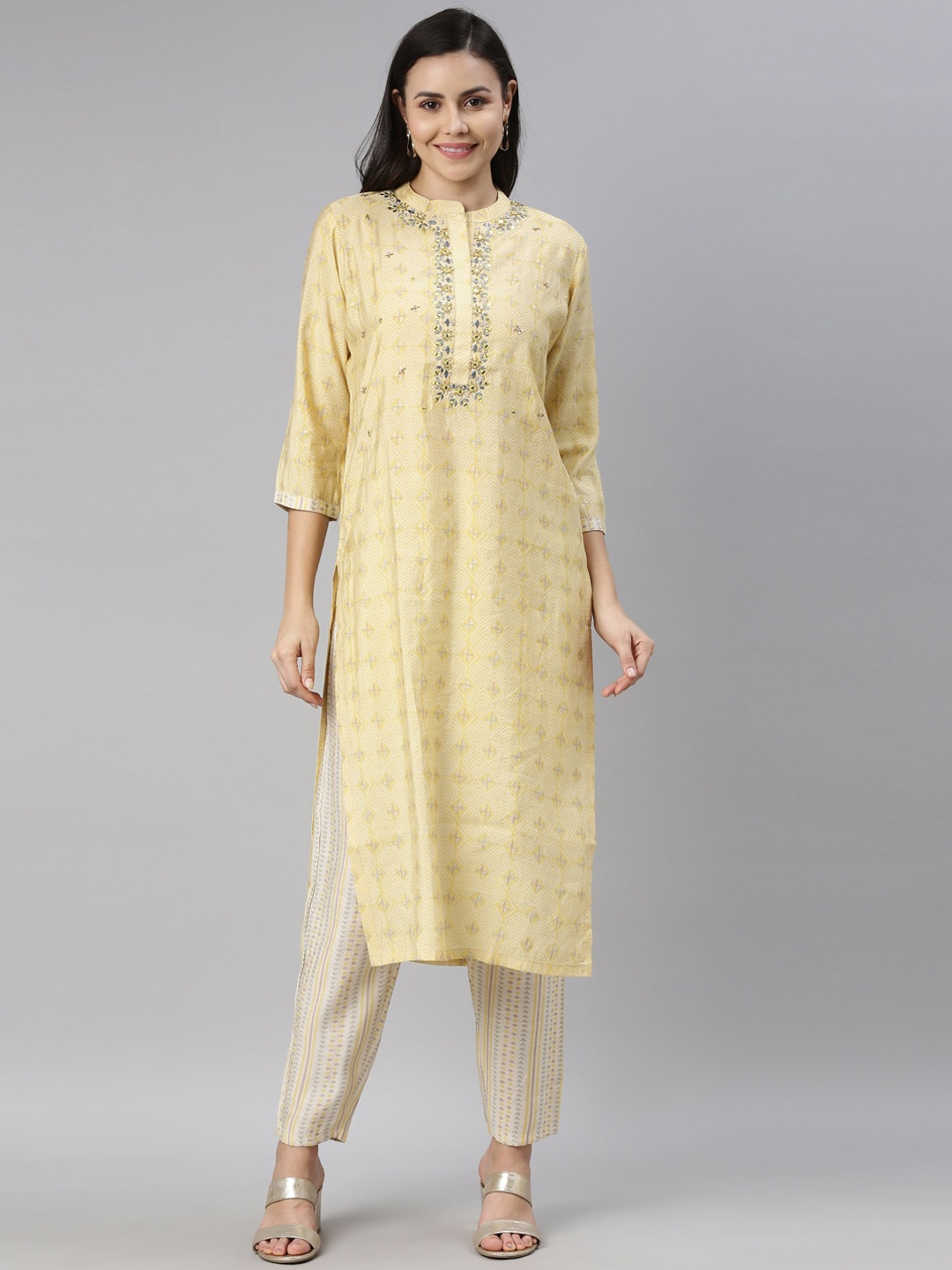 

Neerus Women Yellow Ethnic Motifs Embroidered Mirror Work Kurta with Trousers