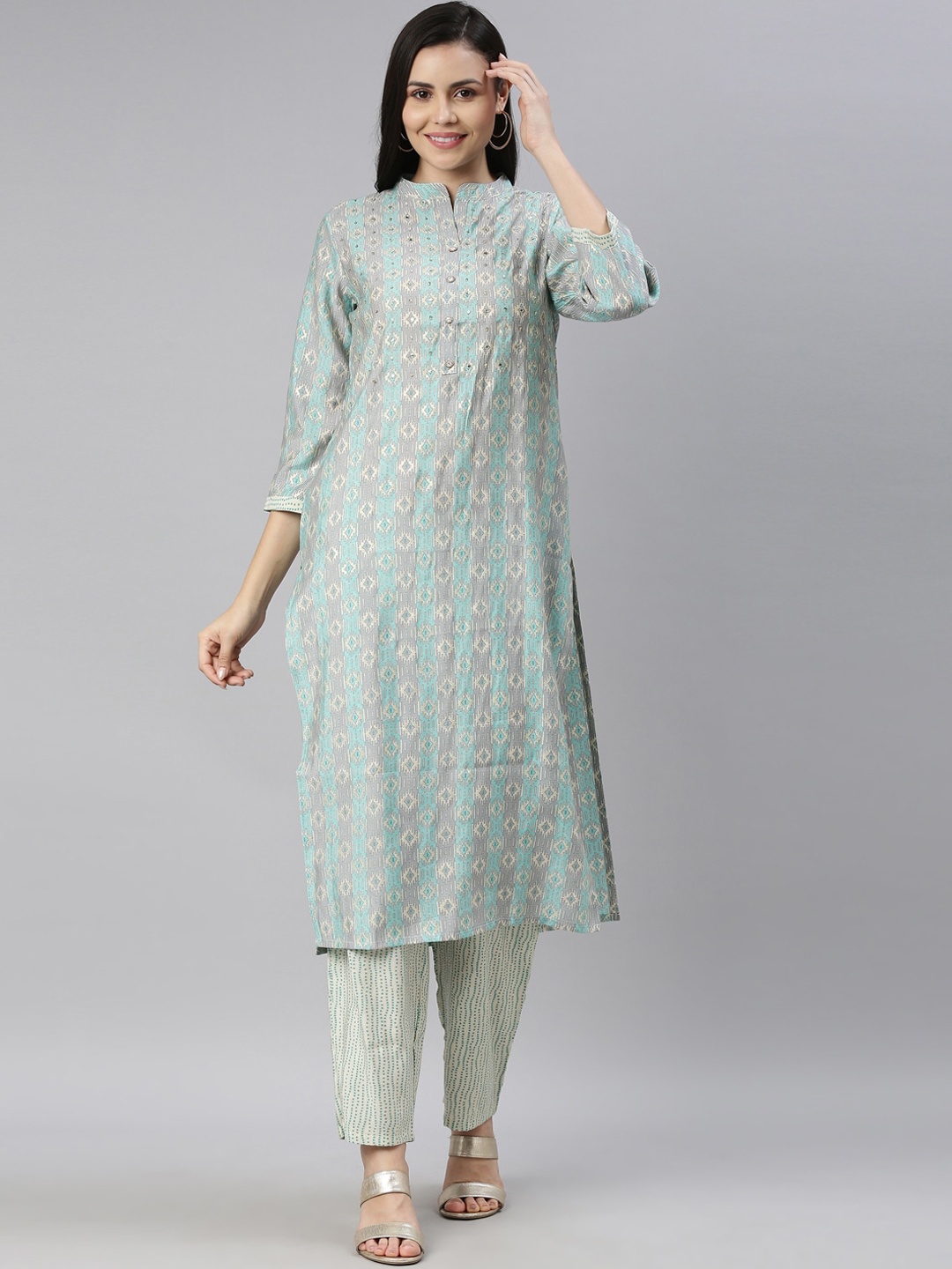 

Neerus Women Turquoise Blue Floral Printed Kurti with Trousers