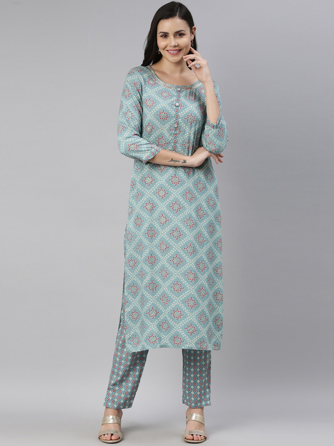 

Neerus Women Turquoise Blue Ethnic Motifs Printed Kurti with Trousers