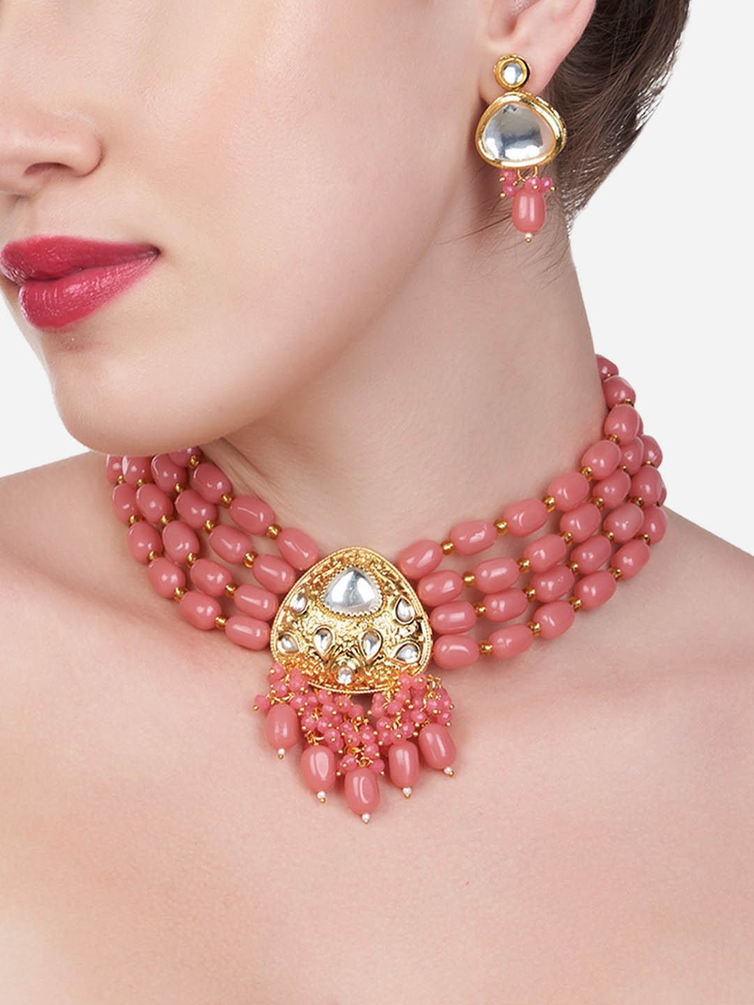 

Zaveri Pearls Women Pink Gold-Plated Kundan Studded Choker Jewellery Set