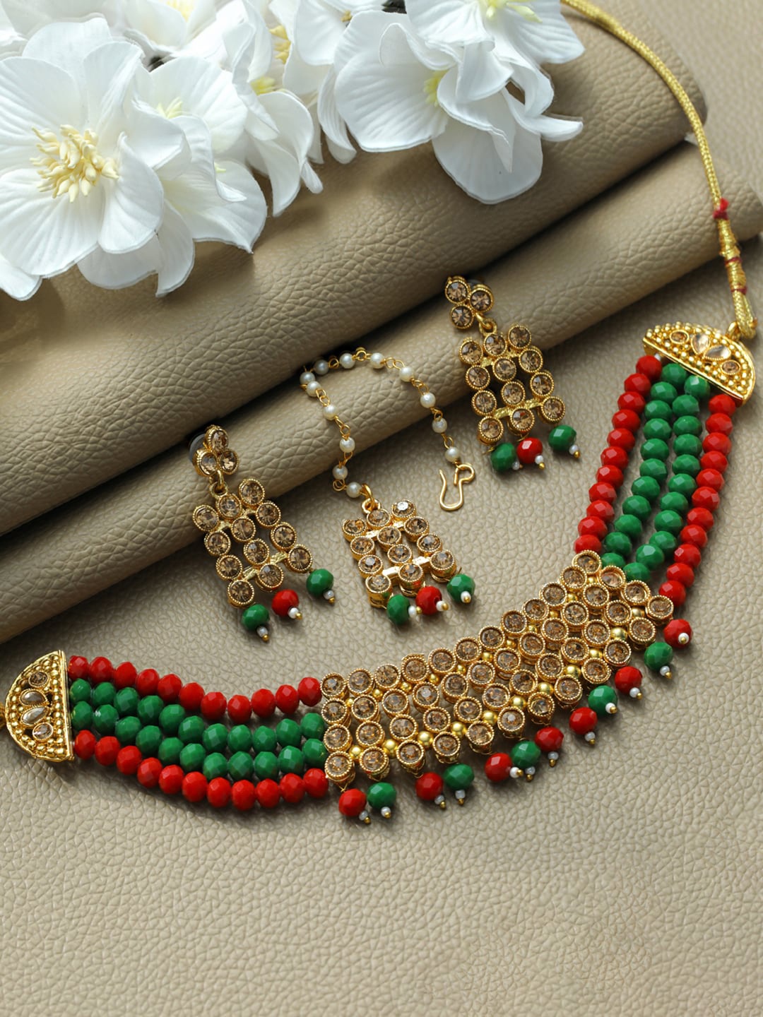 

Priyaasi Women Gold-Plated Red & Green Stone-Studded & Beaded Choker Jewellery Set
