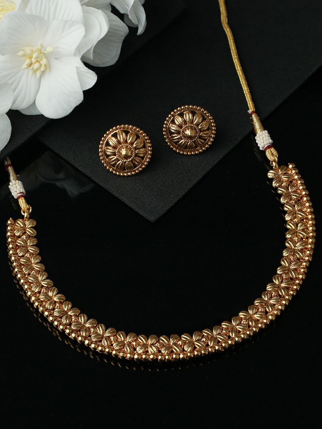 

Priyaasi Women Gold-Plated Traditional Floral pattern Shaped & Beaded Jewellery Set