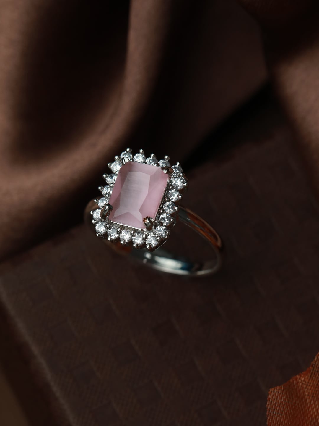 

Priyaasi Women Silver-Plated Pink AD-Studded Adjustable Finger Ring