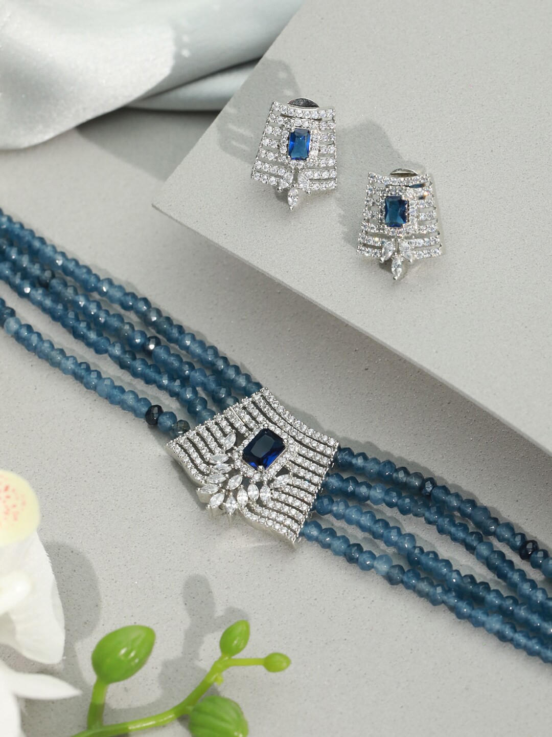 

Priyaasi Women Silver-Plated Blue AD-Studded & Beaded Multilayer Choker Jewellery Set
