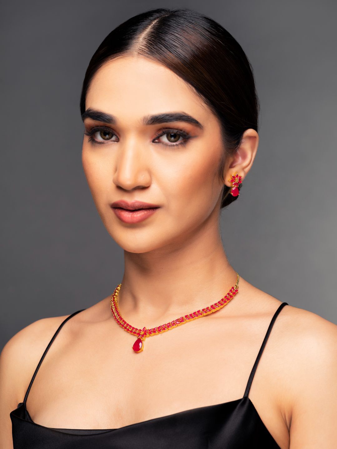 

Priyaasi Gold-Plated Pink Stone Studded & Beaded Jewellery Set