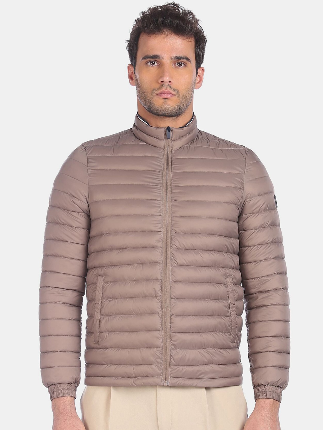 

Arrow Sport Men Beige Solid High Neck Puffer Jacket