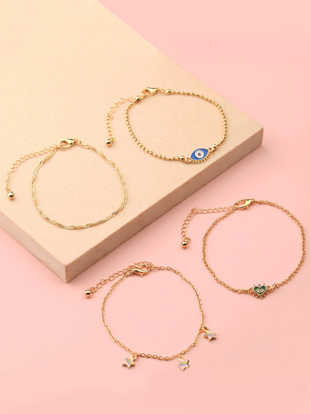 

Accessorize London Women Set Of 4 Gold-Toned Eye Candy Rainbow Stars Bracelet