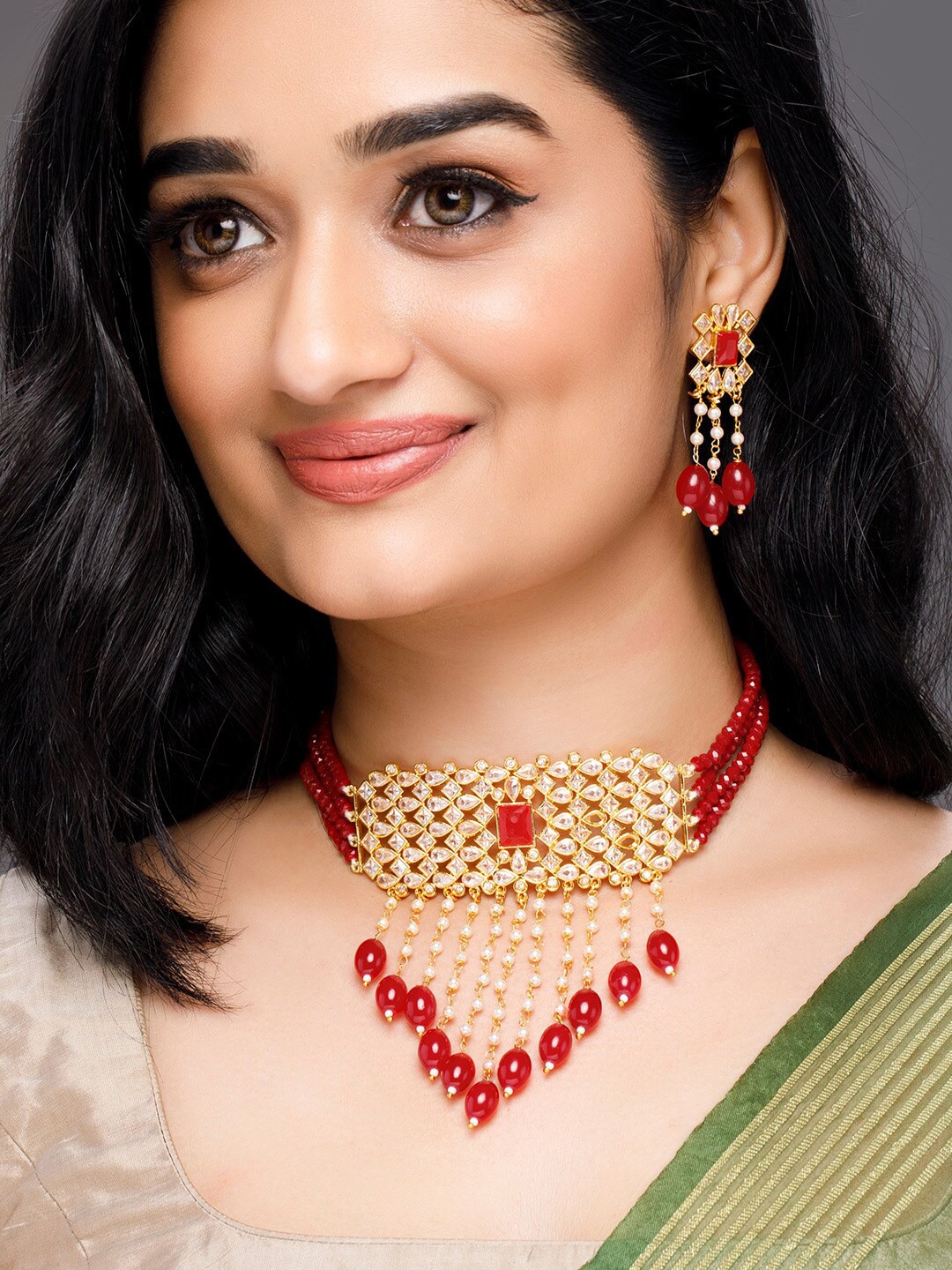 

Anouk Gold-Plated Artificial Stone Studded Choker Jewellery Set