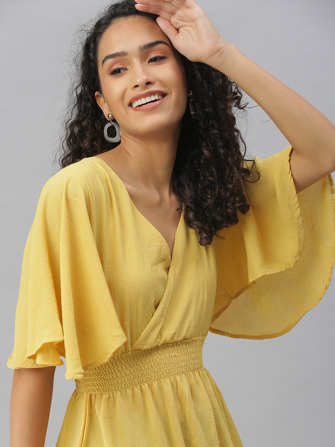 

SHOWOFF Yellow Solid Wrap Top