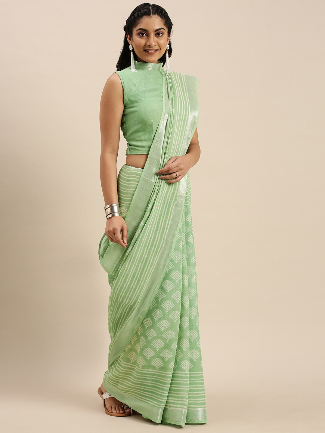 

Shaily Green & White Ethnic Motifs Zari Linen Blend Saree