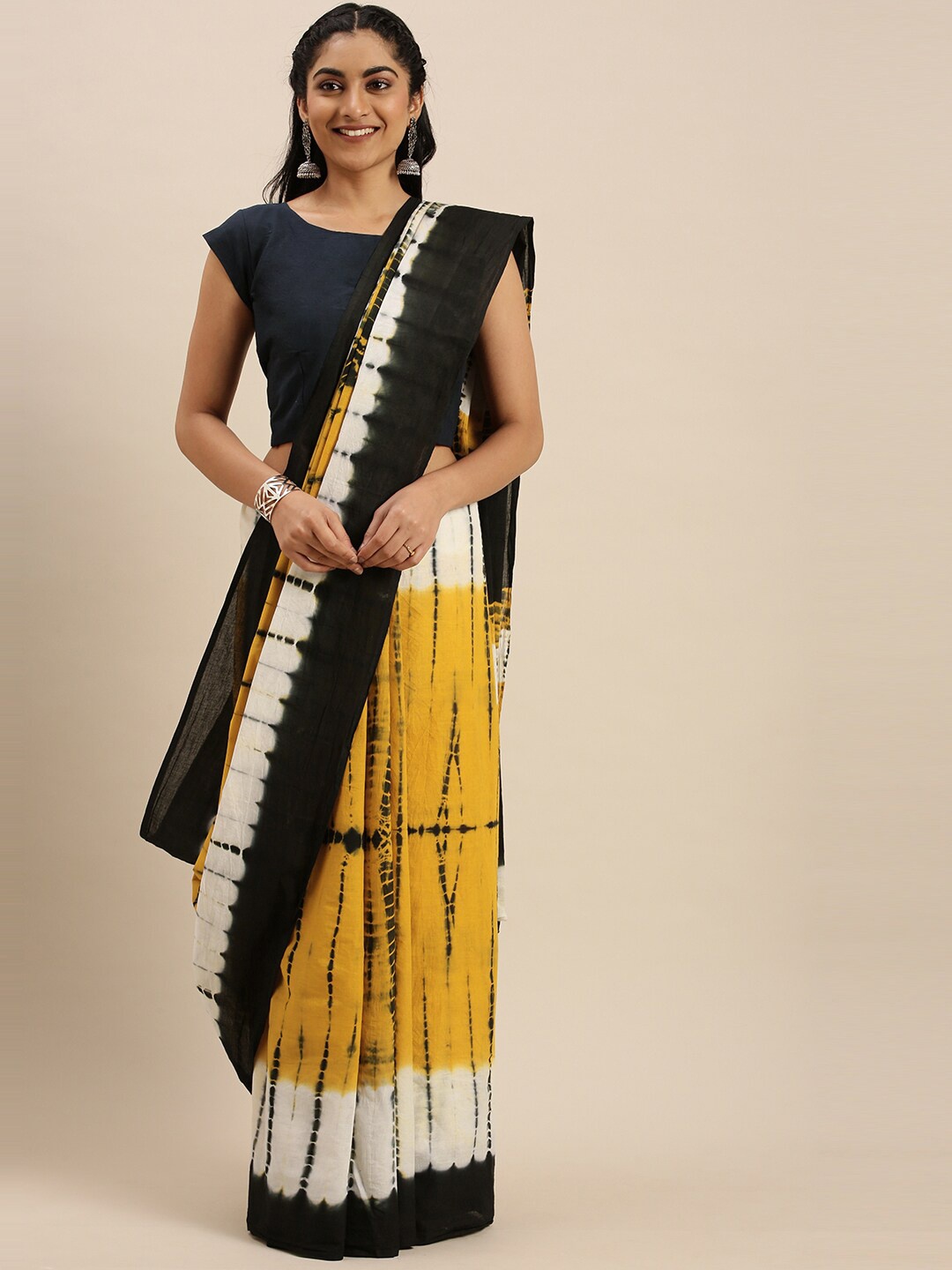 

Shaily Mustard & Black Tie and Dye Pure Cotton Saree