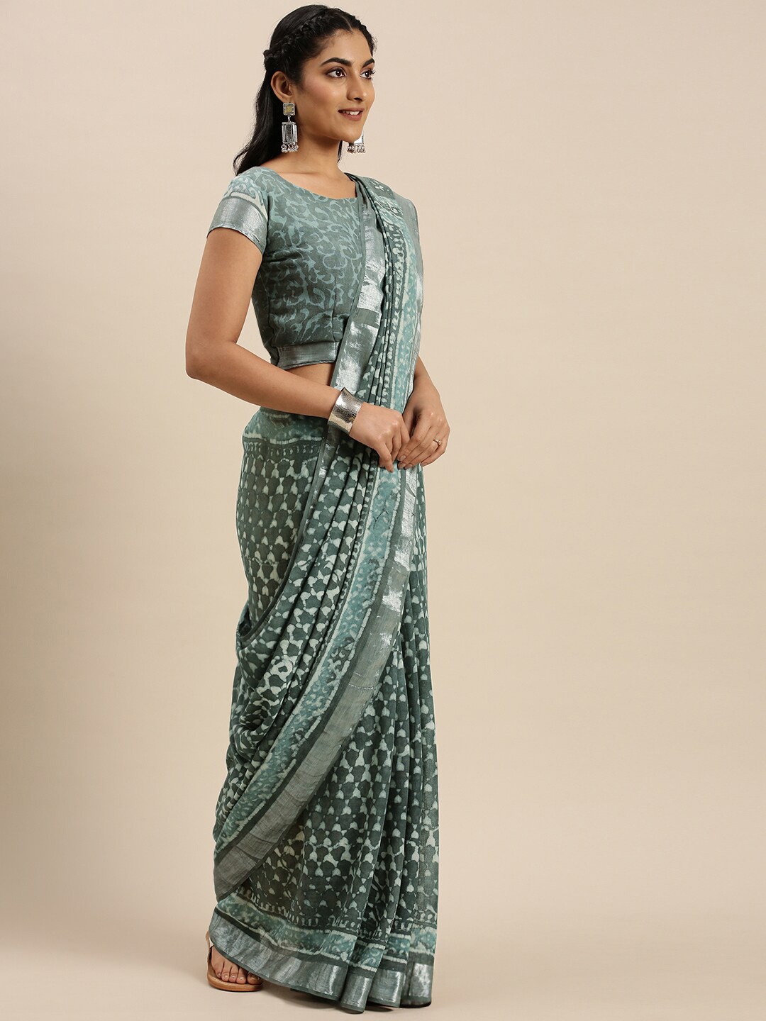 

Shaily Green & White Ethnic Motifs Zari Linen Blend Saree