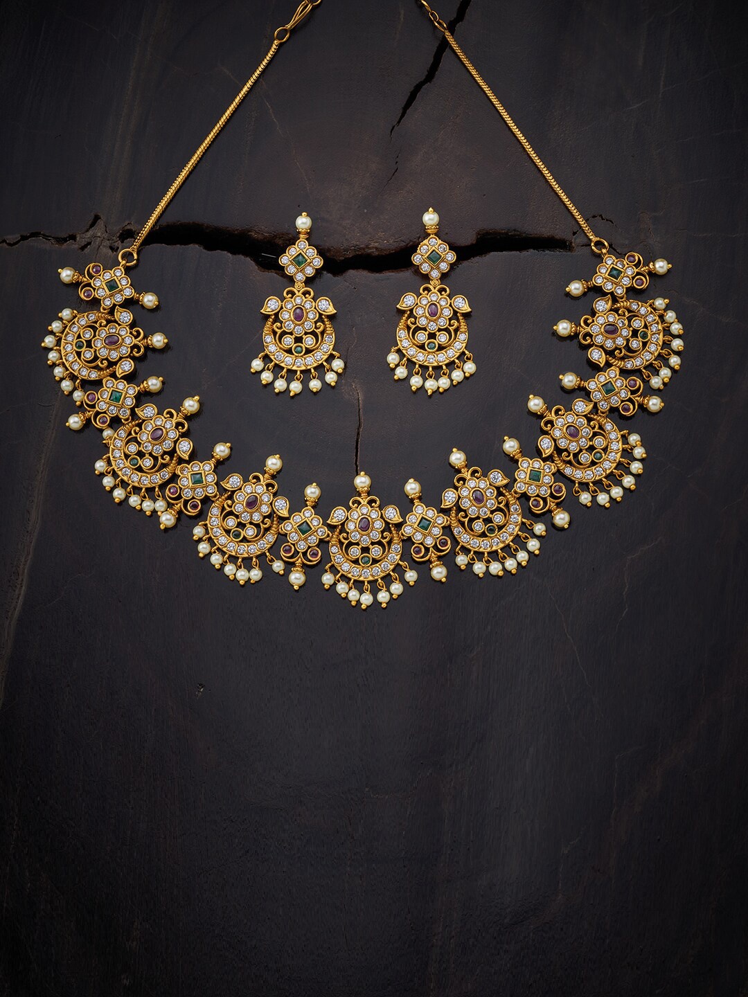 

Kushal's Fashion Jewellery Red Gold-Plated Antique Jewellery Set