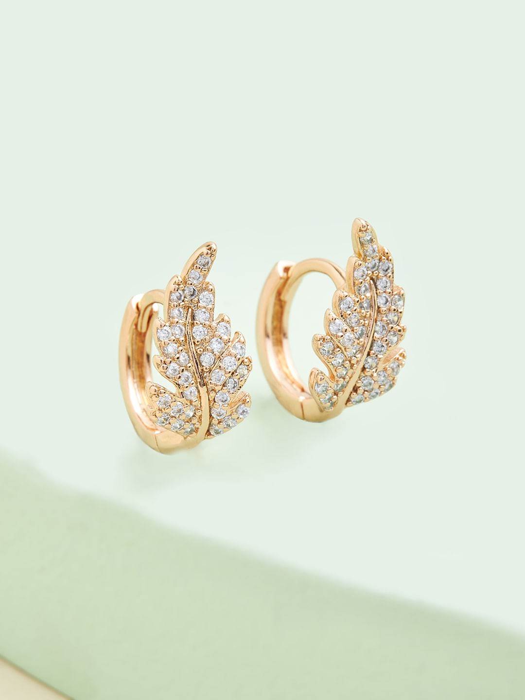 

Kushal's Fashion Jewellery White Leaf Shaped Studs Earrings