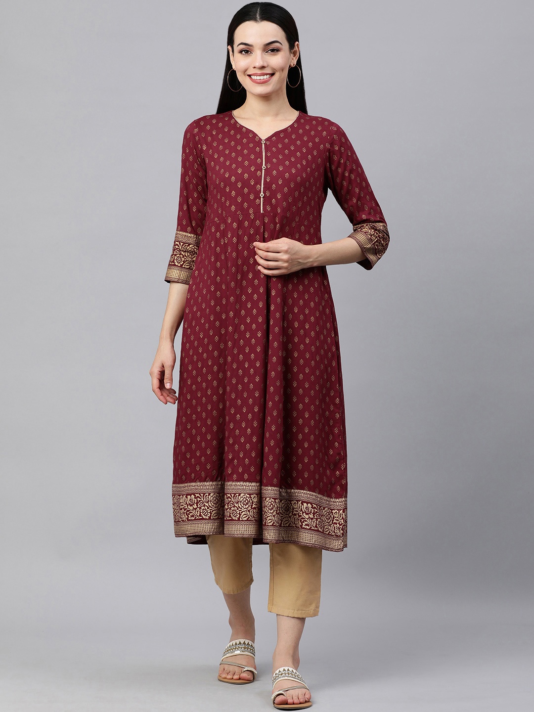 

KALINI Women Maroon & Golden Ethnic Motifs Printed Kurta