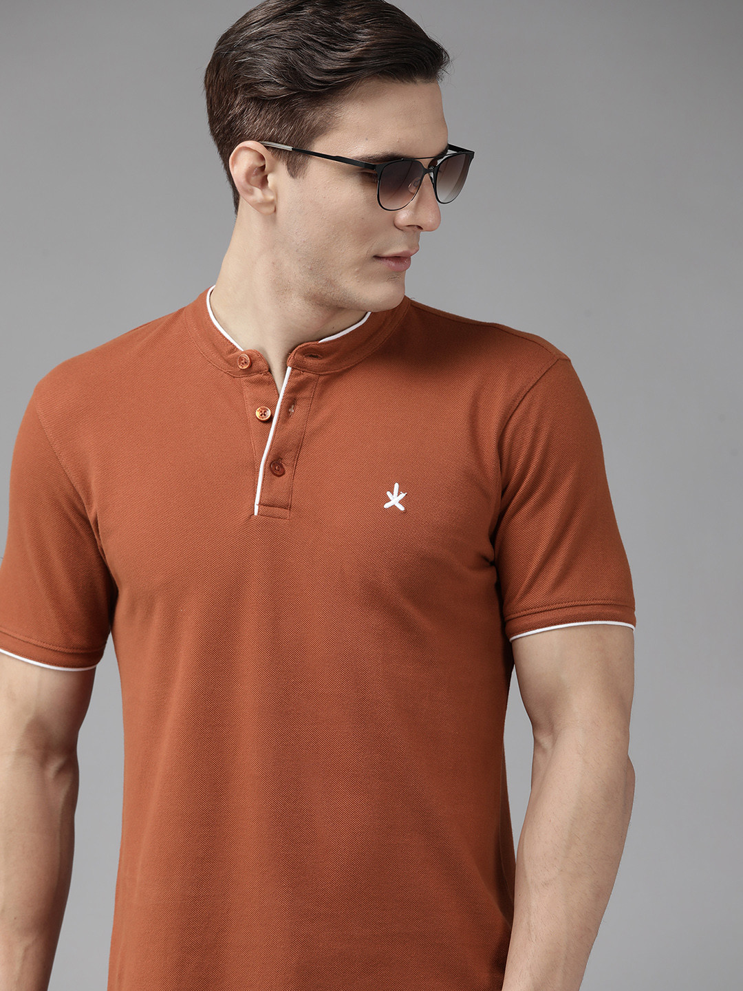 

Roadster Men Rust Red Pure Cotton Solid T-shirt
