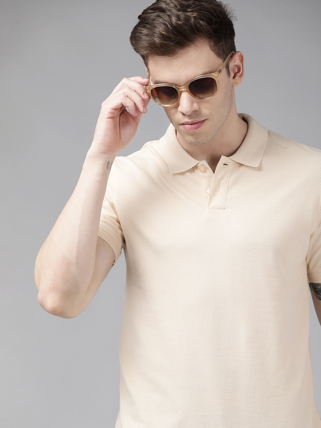 

Roadster Men Cream-Coloured Pure Cotton Solid Polo Collar T-shirt