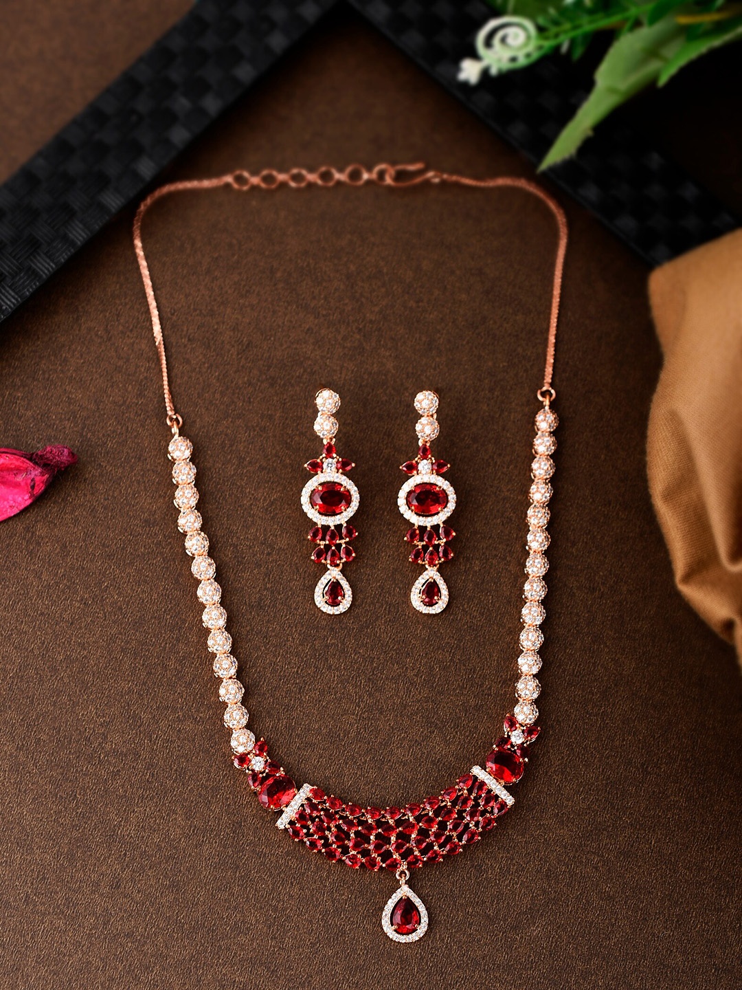 

Shoshaa Gold Plated & Red AD Stone Studded Handcrafted Jewellery Set