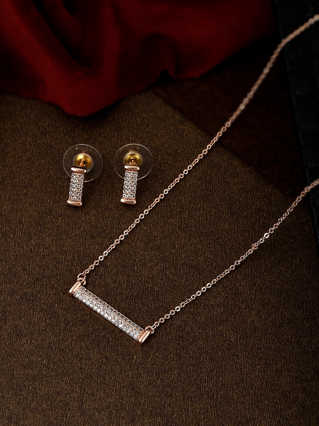 

Shoshaa Gold-Plated Handcrafted White AD Studded & Beaded Jewellery Set