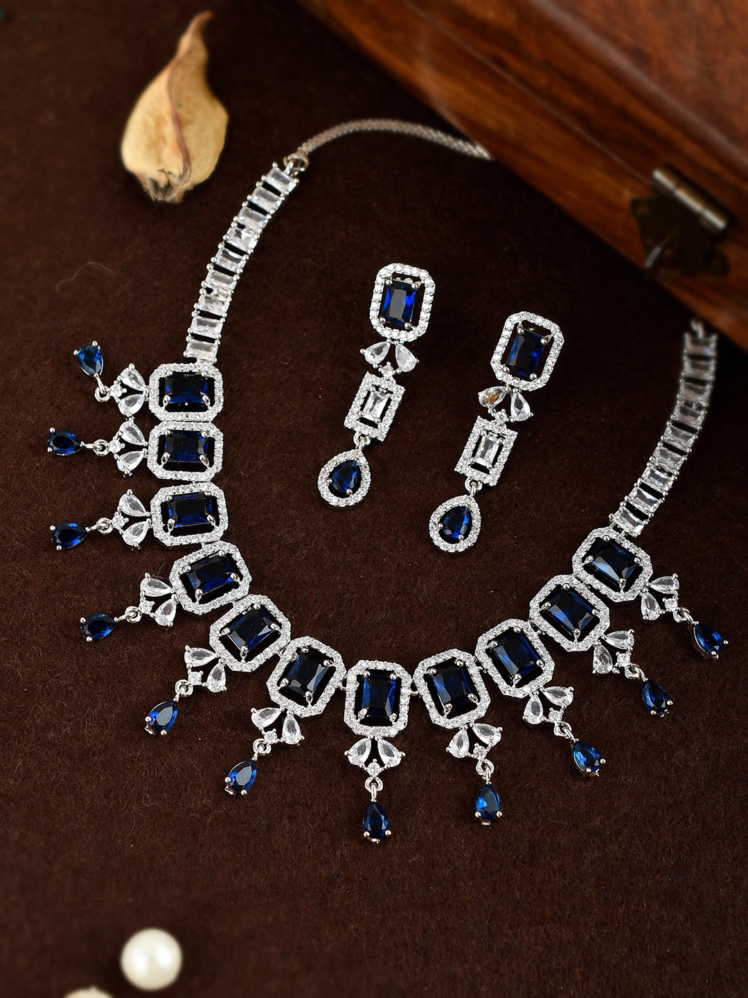 

Shoshaa Silver-Plated White & Blue AD Stone Studded Jewellery Set