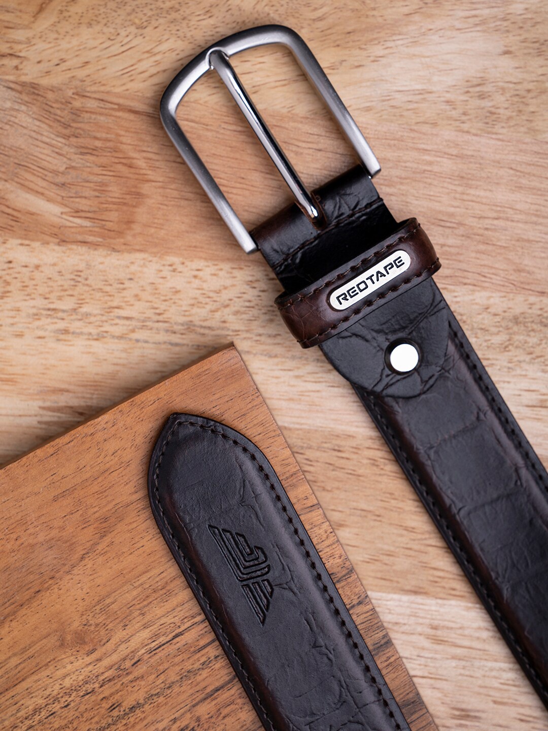 

Red Tape Men Brown Textured Leather Belt