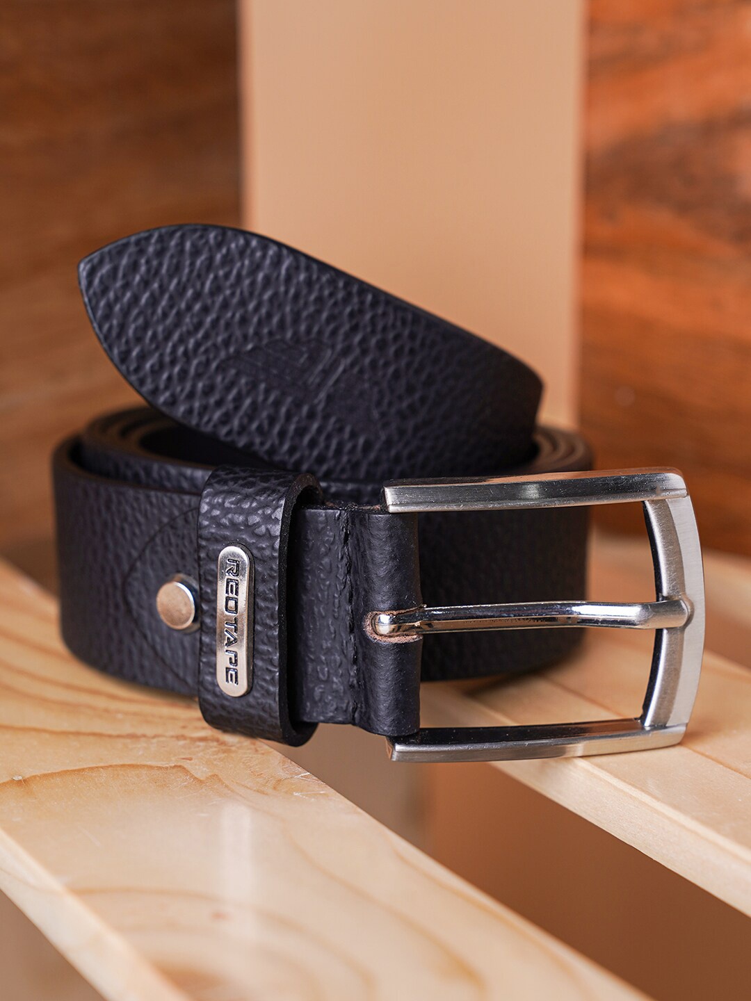 

Red Tape Men Black Textured Leather Formal Belt