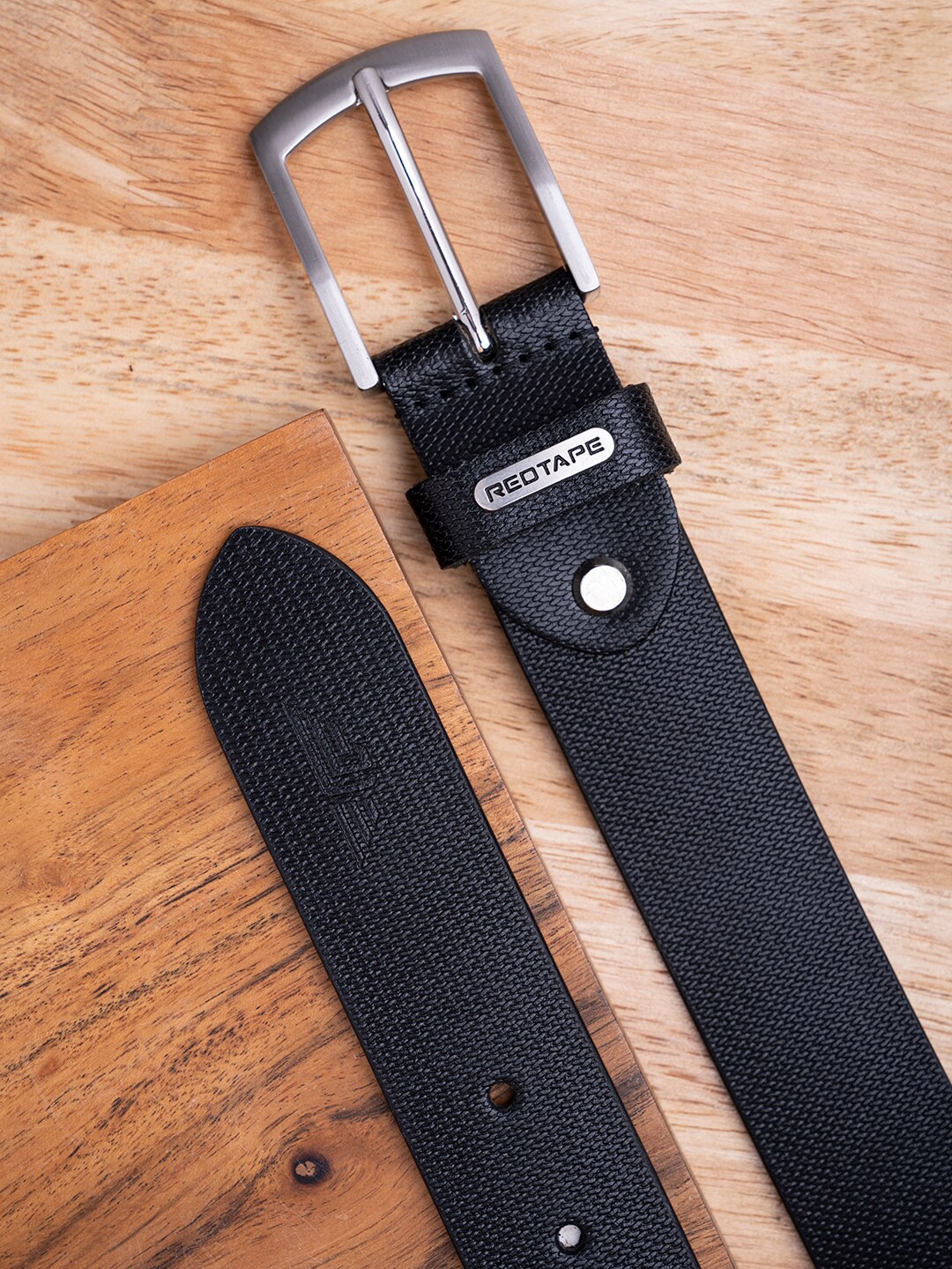 

Red Tape Men Black Textured Leather Formal Belt