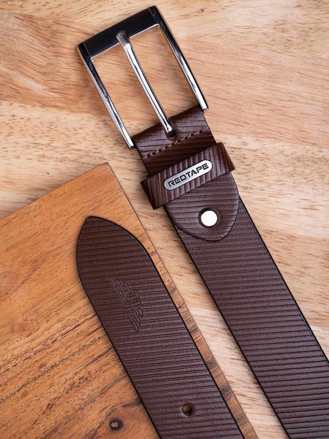 

Red Tape Men Brown Textured Leather Belt