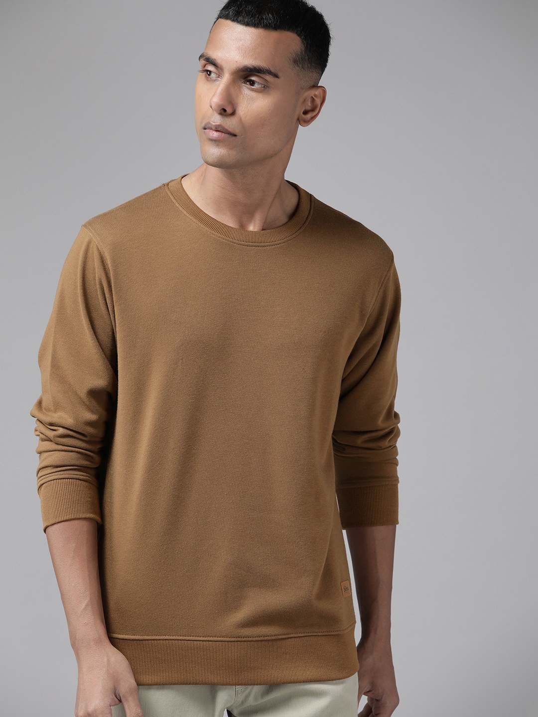 

Roadster Men Solid Sweatshirt, Brown