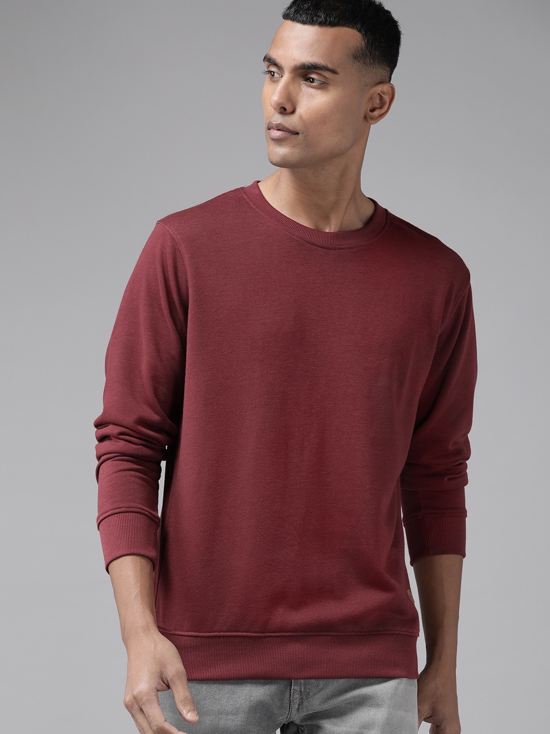 

The Roadster Lifestyle Co. Men Solid Sweatshirt, Rust