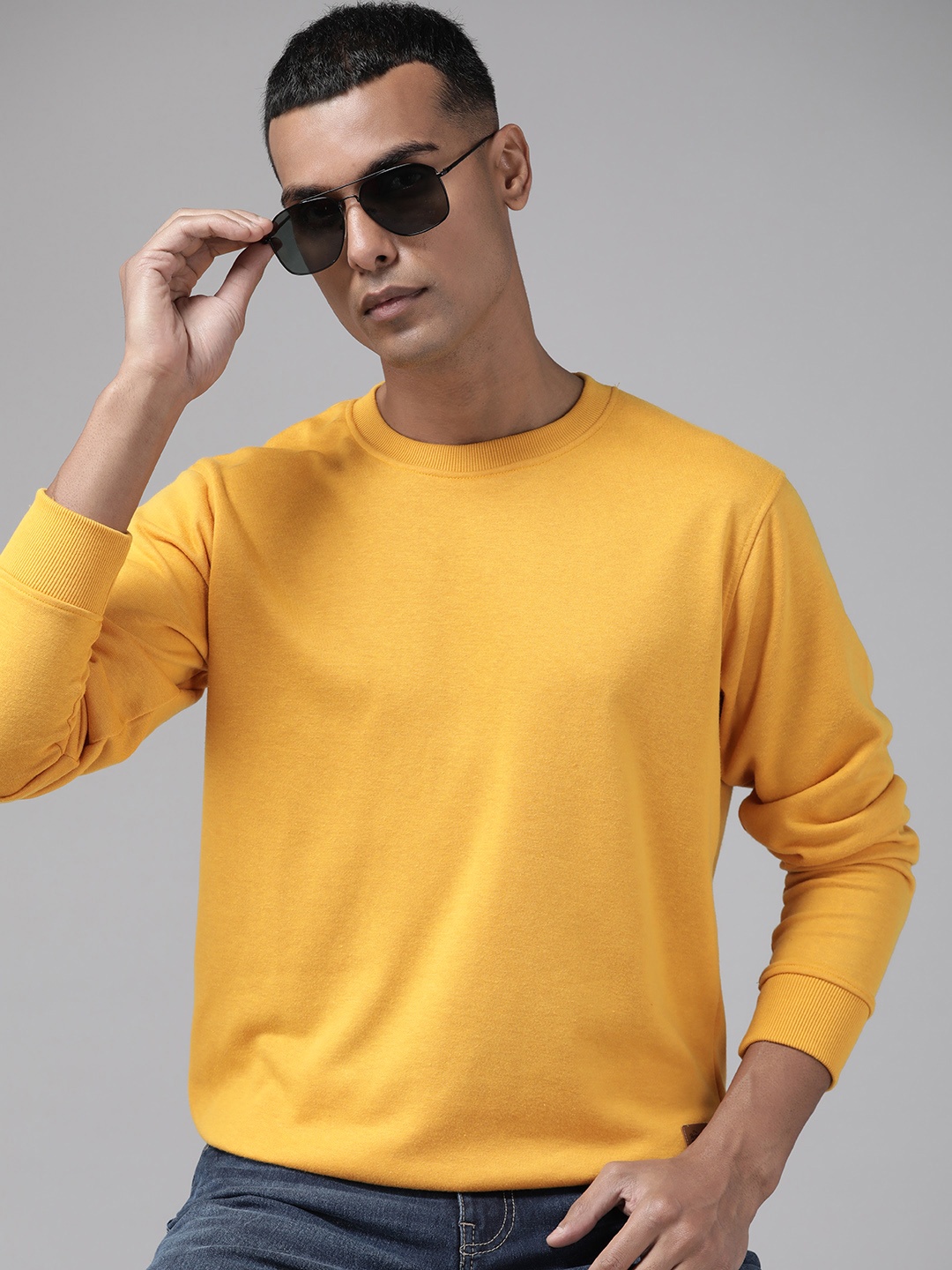 The Roadster Lifestyle Co. Men Solid Sweatshirt, Yellow