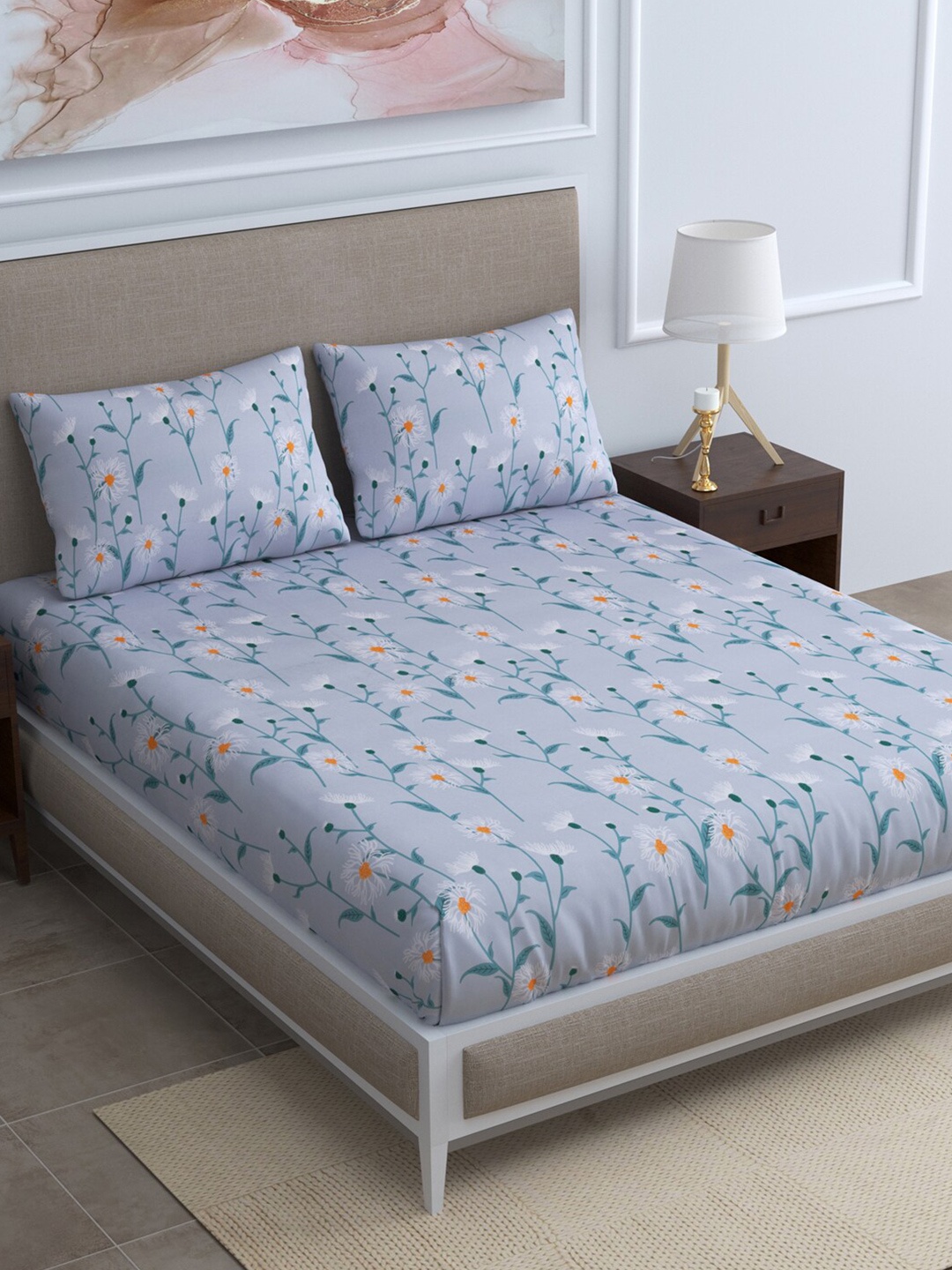 

Rudra Bazaar Blue & White Floral 210 TC Cotton King Bedsheet with 2 Pillow Covers