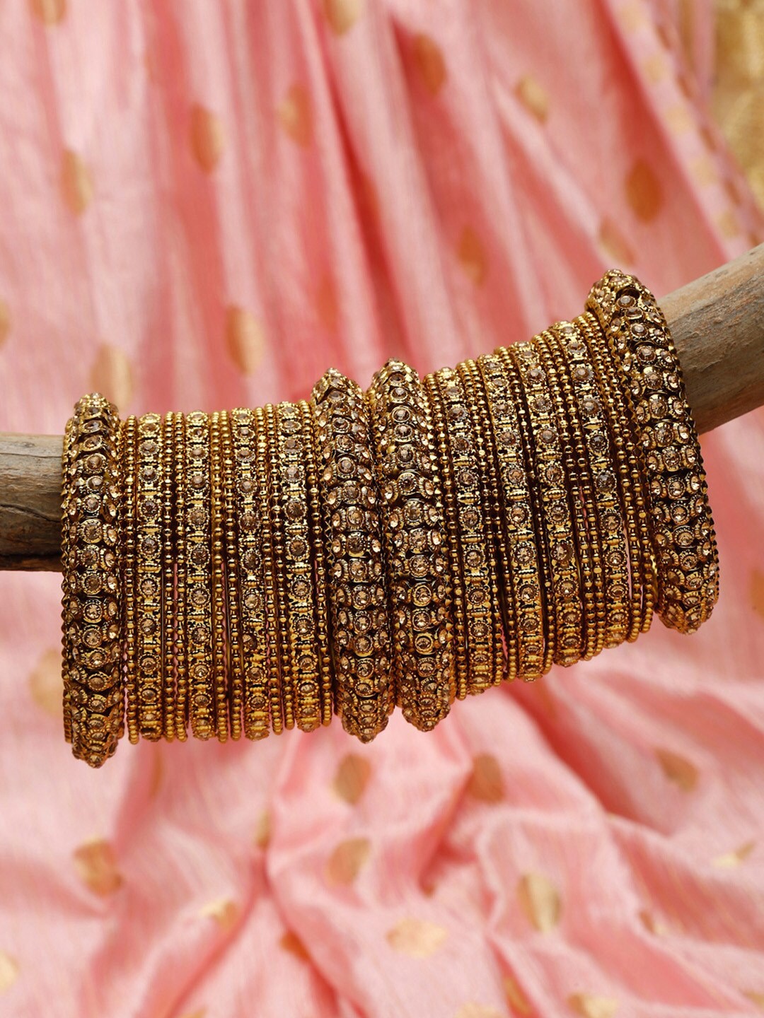 

Shining Diva Set Of 28 Gold-Plated Gold-Colored Crystal-Studded Antique Bangle