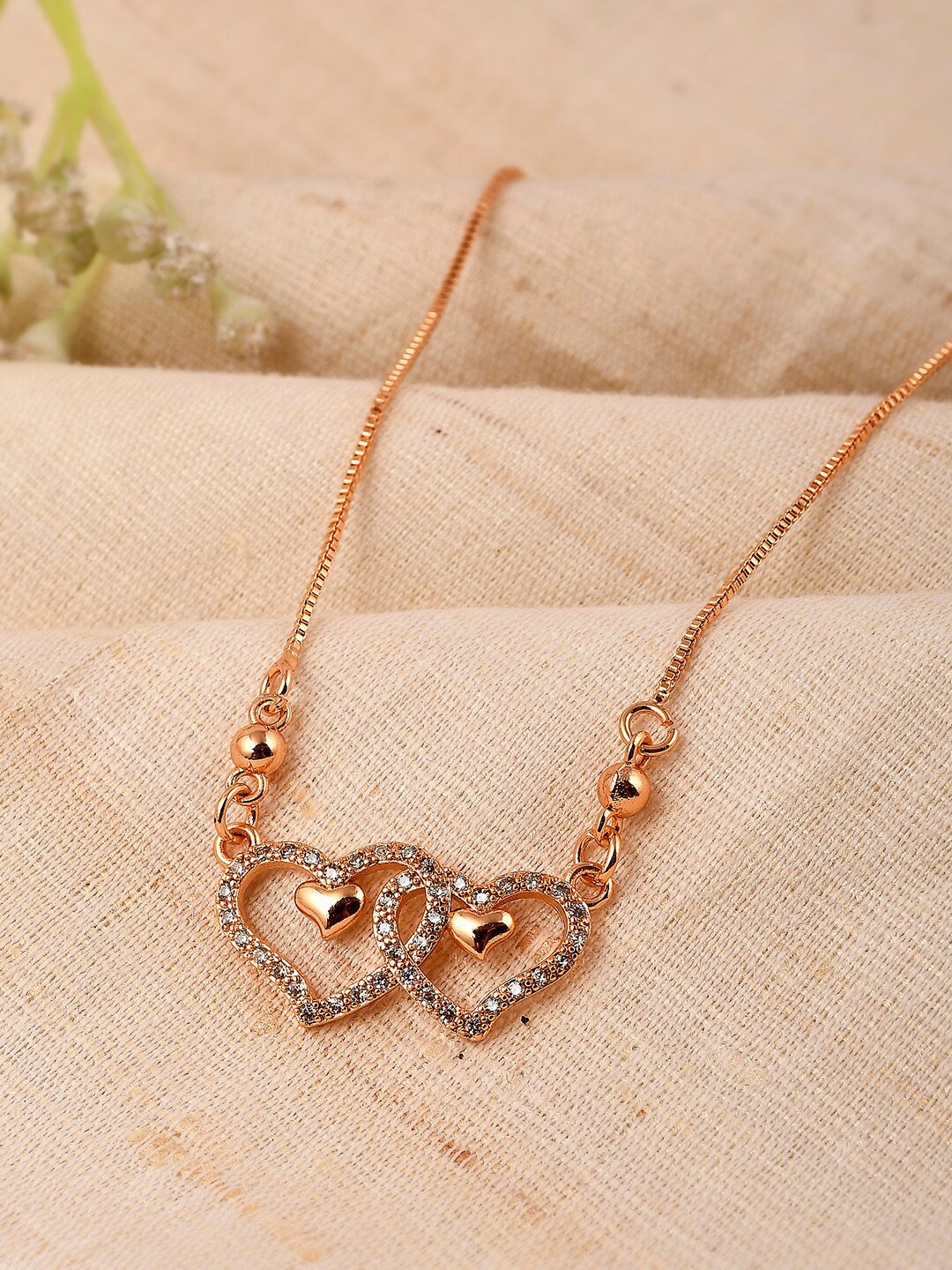

Shoshaa Gold-Plated Handcrafted Heart Shaped AD Stones Chains