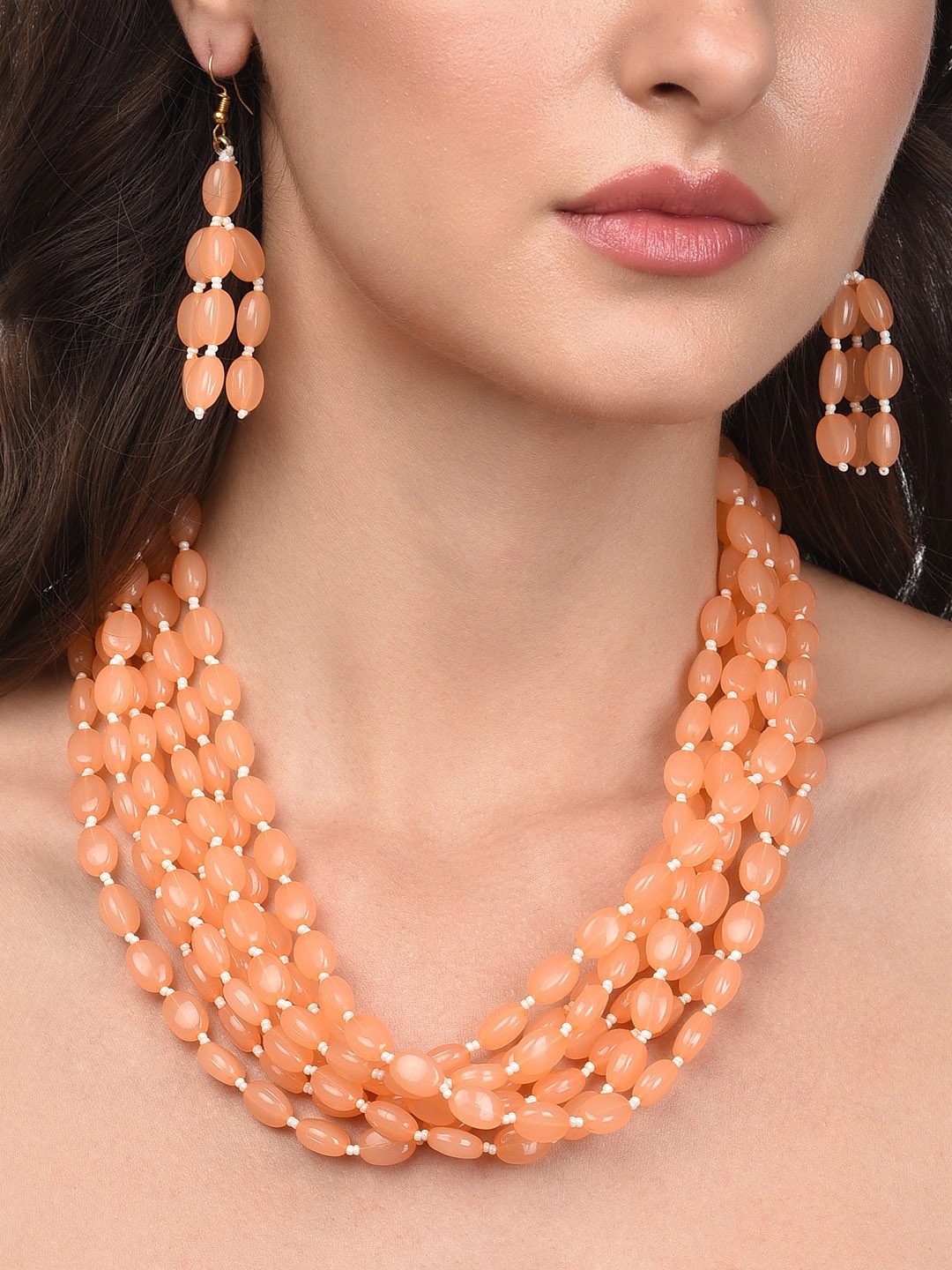

Zaveri Pearls Gold-Plated Peach Stone Beaded Jewellery Set
