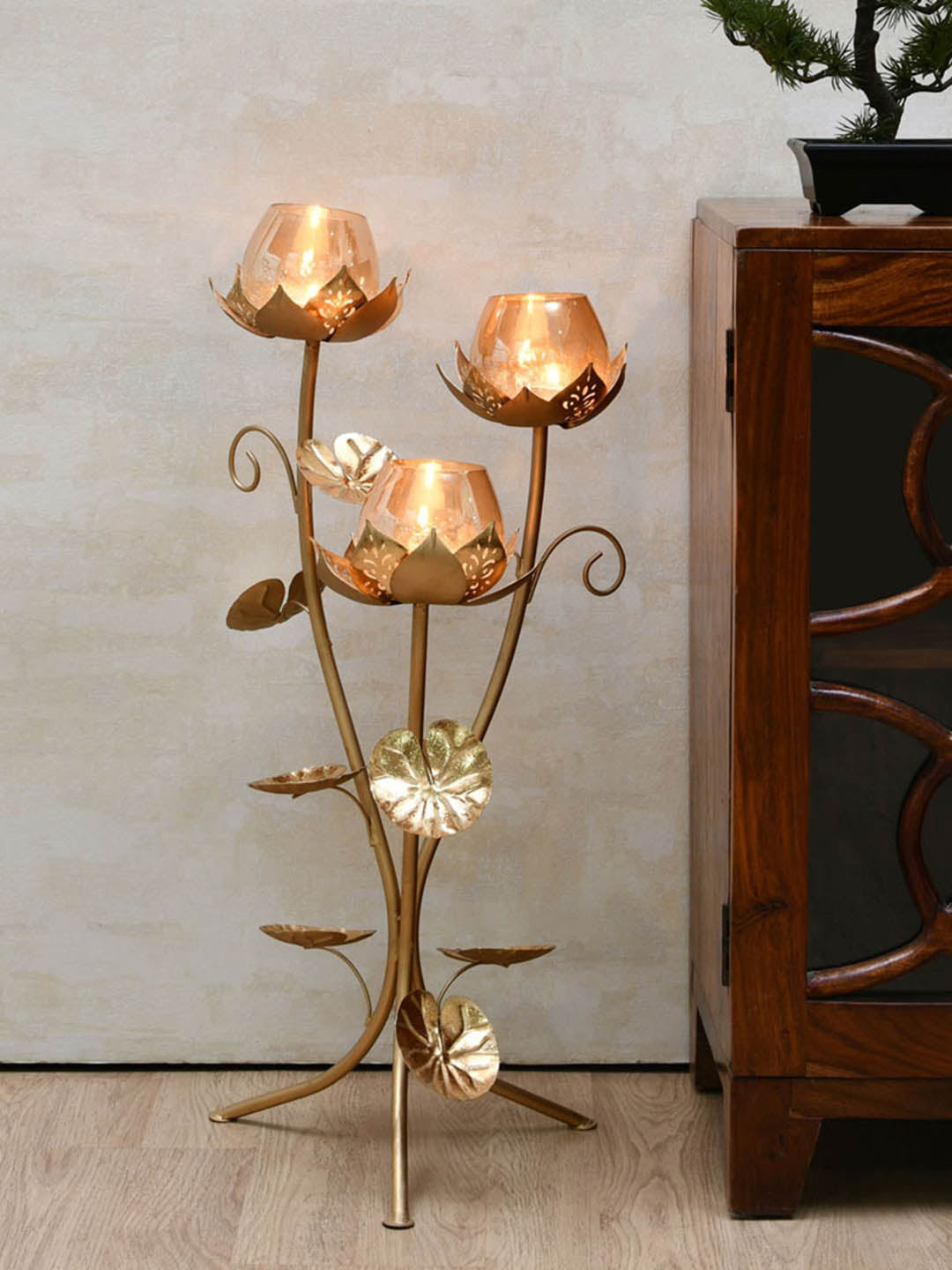 

Athome by Nilkamal Gold-Toned Lotus Floor Candle Stand