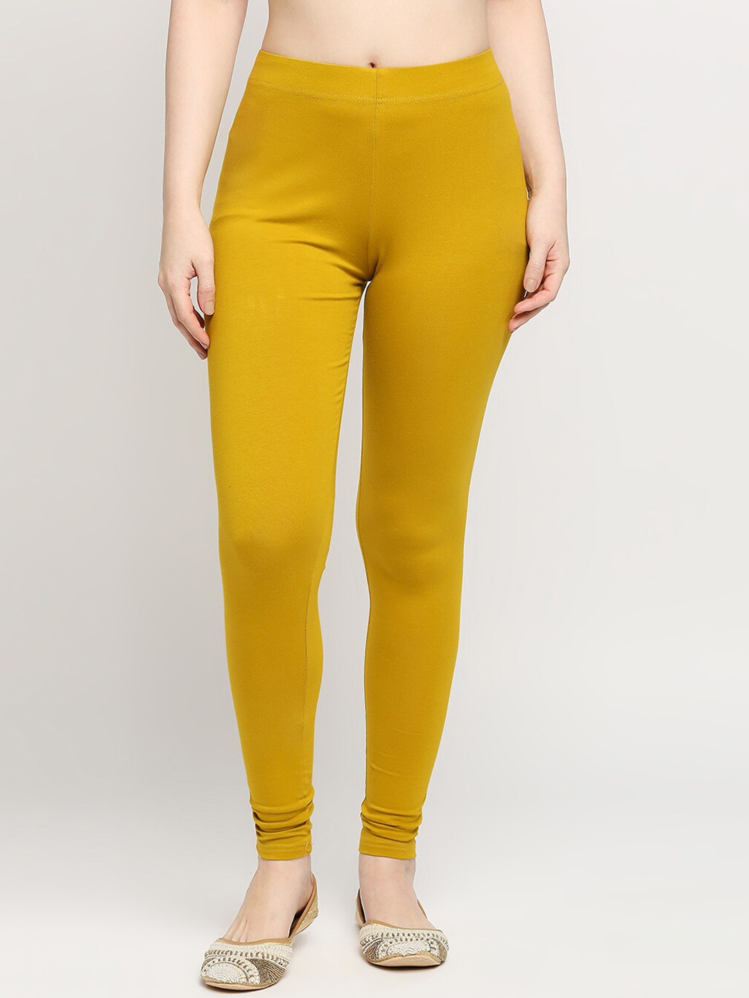 

ZRI Women Mustard-Yellow Solid Churidar-Length Leggings