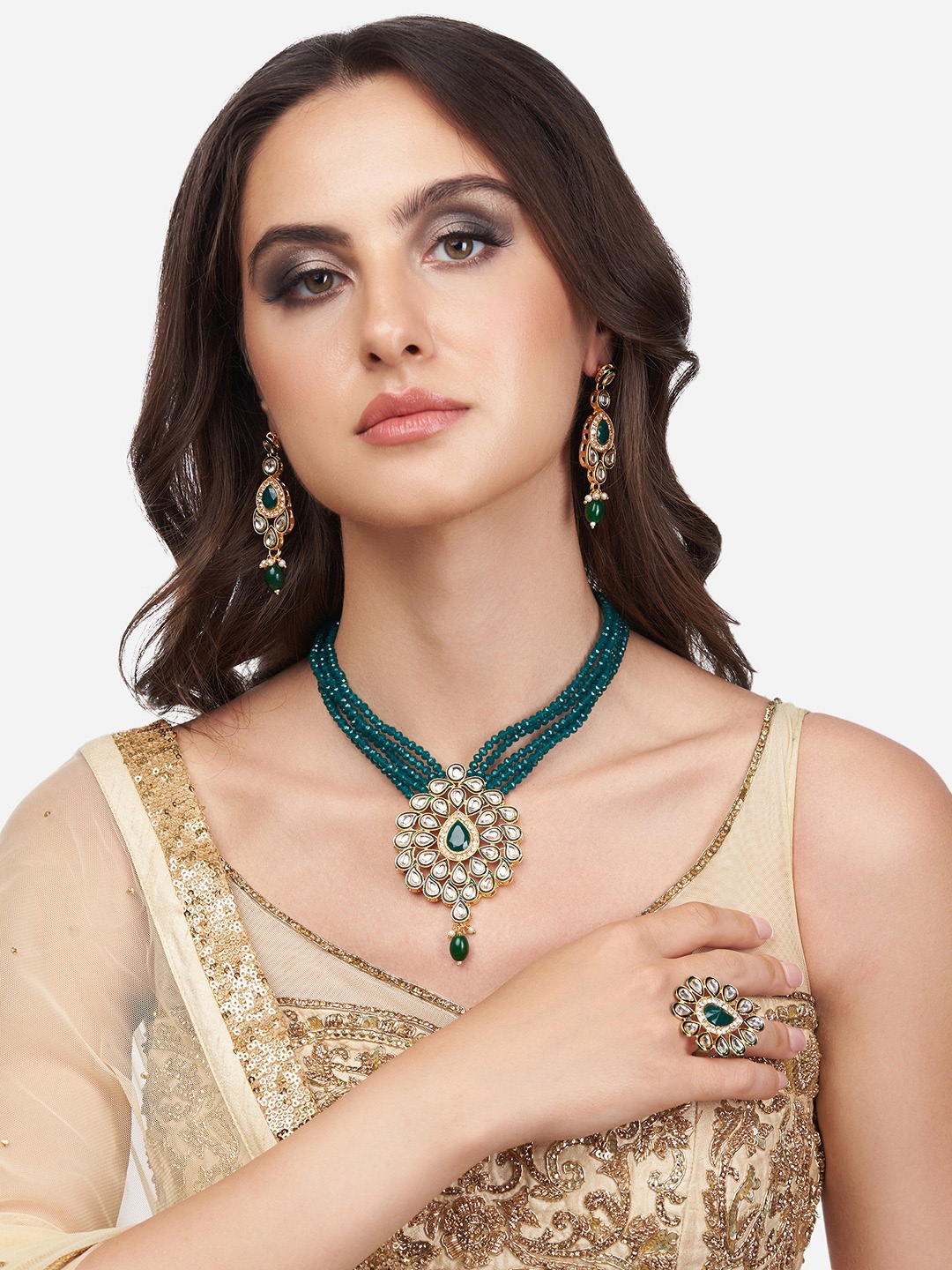 

Zaveri Pearls Gold-Toned Green Kundan Studded Multistrand Jewellery Set