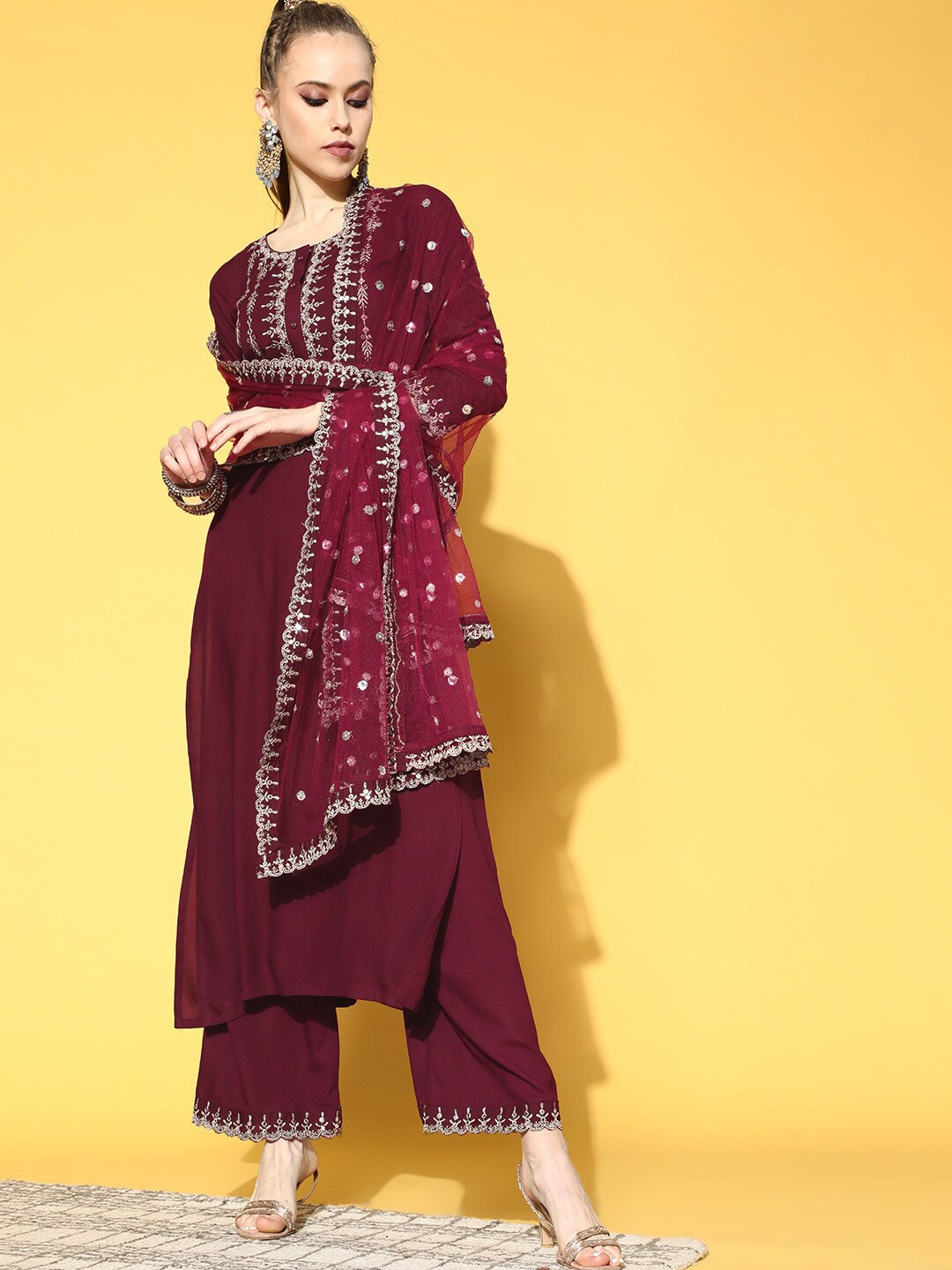 

Nayo Women Burgundy Ethnic Motifs Embroidered Layered Mirror Work Kurta with Trousers & With Dupatta