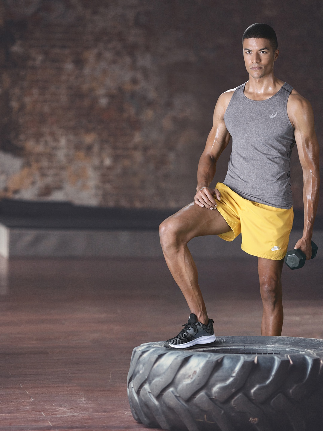 

ASICS Men Grey Solid Sleeveless Running T-shirt