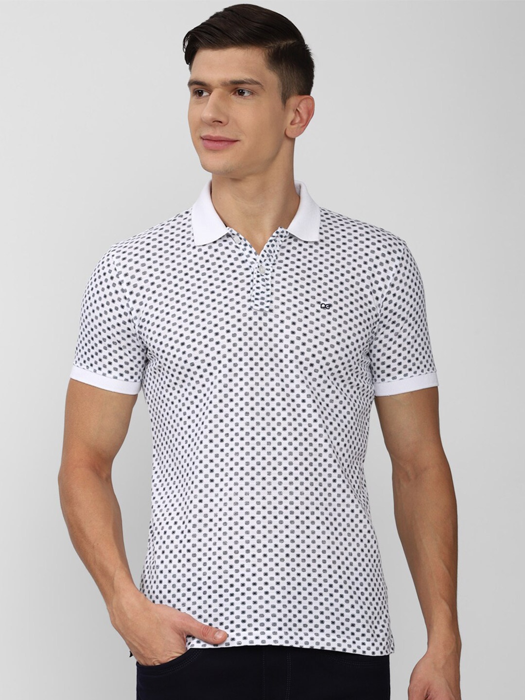 

Peter England Casuals Men White & Black Printed Polo Collar Slim Fit T-shirt
